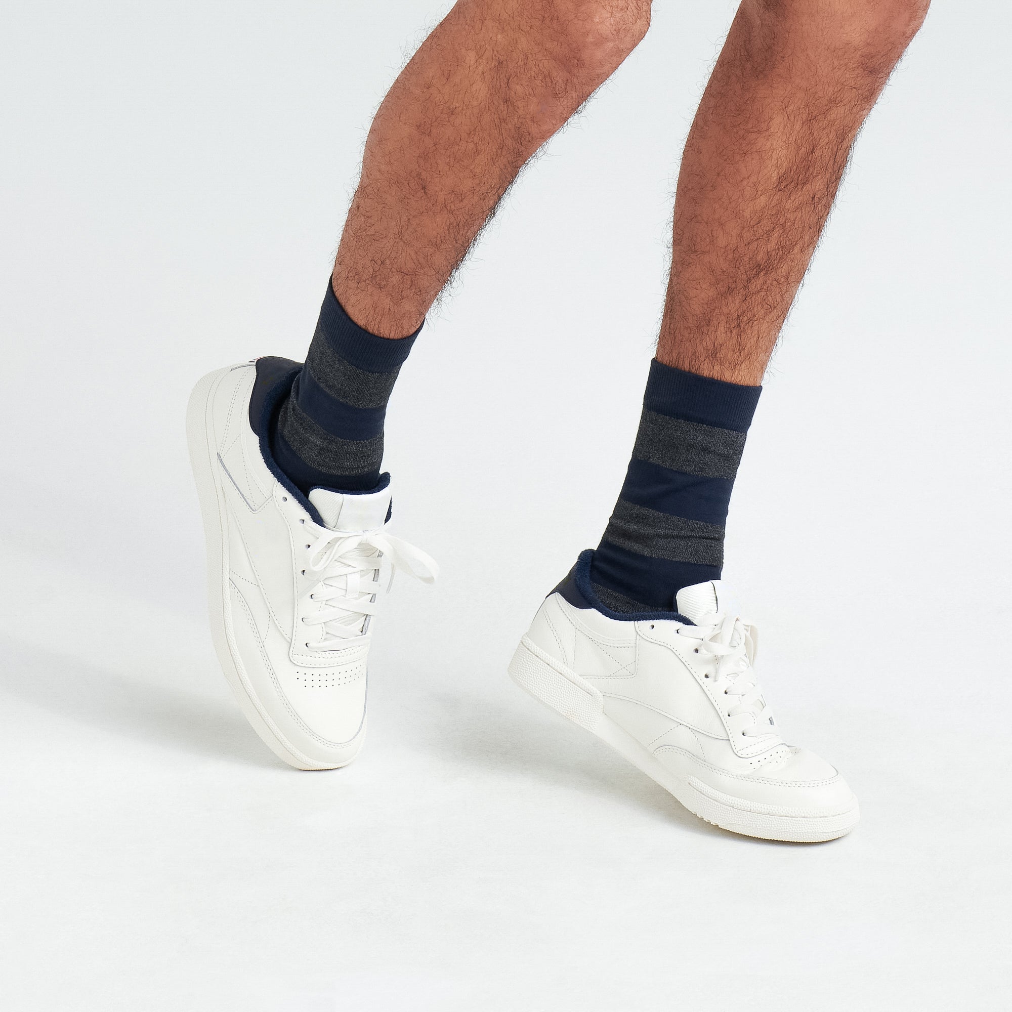 Side - Model wearing Whole Package Crew Sock in Ombre Rugby-Graphite/Navy