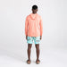 Back - Model wearing Droptemp All Day Cooling  Hoodie in Burnt Coral Heather