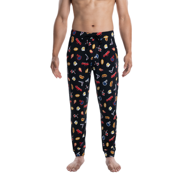 Front - Model wearing Snooze Sleep Pant in Football Gamer- Black