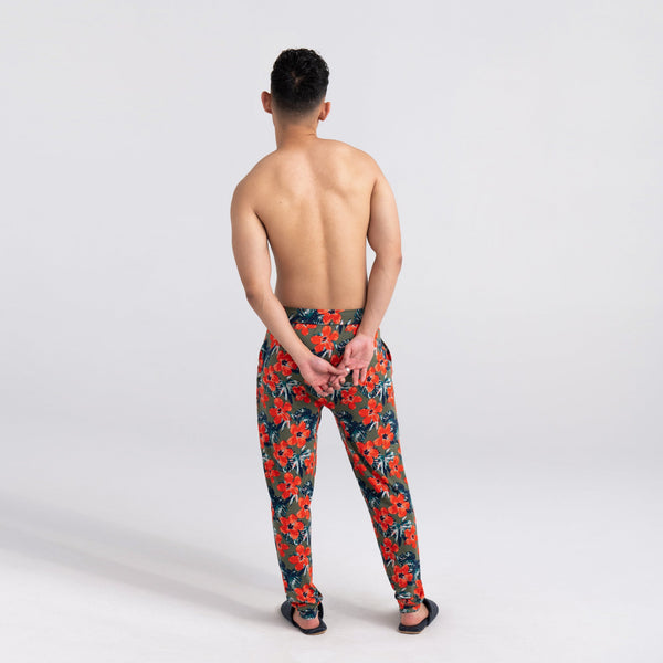 Back - Model wearing Snooze Pant in Solar Hibiscus- Multi