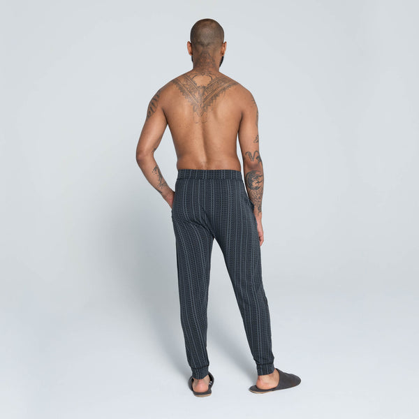 Back - Model wearing Viewfinder Sleep Pant in Have A Nice Day- Grey