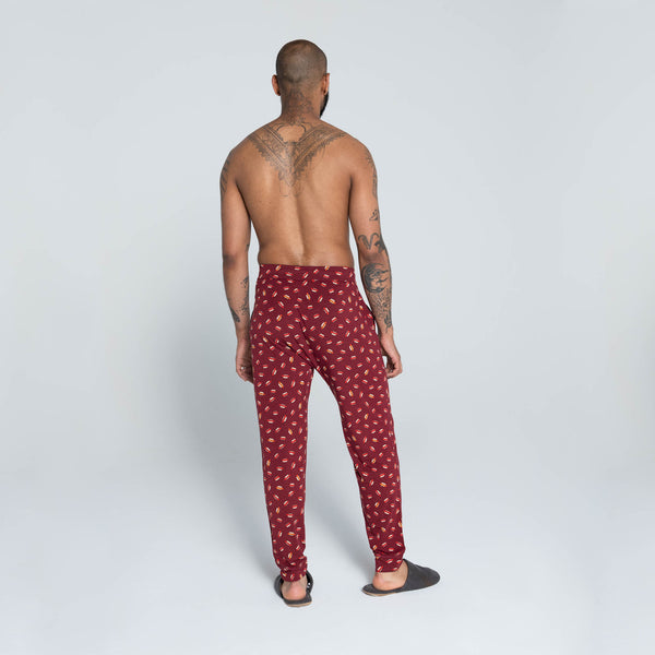 Back - Model wearing Viewfinder Sleep Pant in Hot Diggity- Red