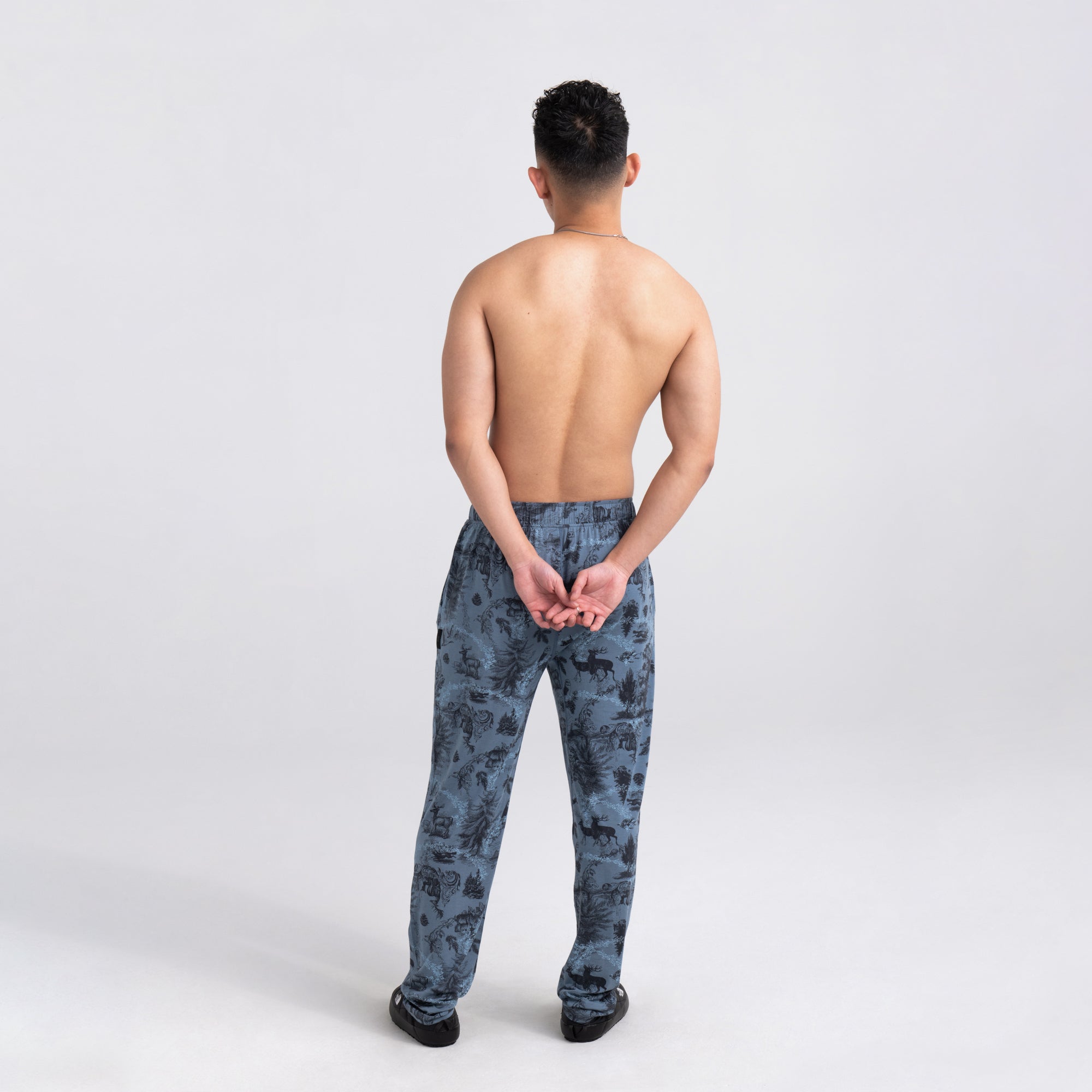 Back - Model wearing 22nd Century Silk Pant in Foile Toile- Blue