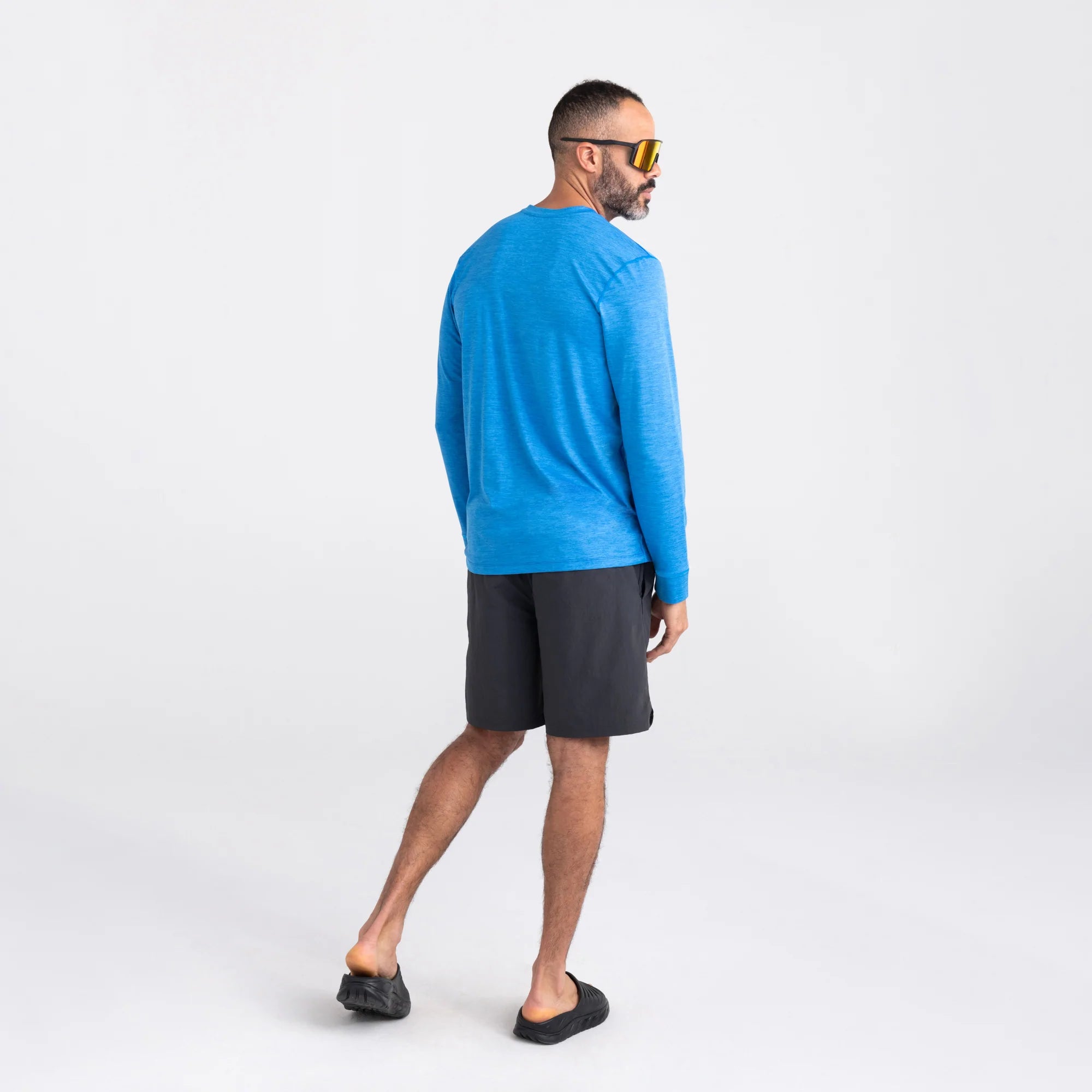Back - Model wearing Droptemp All Day Cooling Long Sleeve Crew in Racer Blue Heather