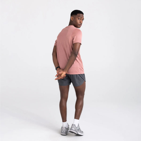 Back - Model wearing All Day Aerator Tee in Burnt Coral Heather