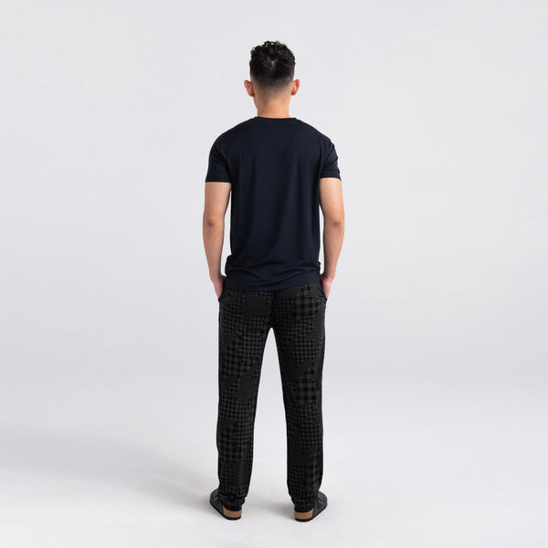 Back - Model wearing 22nd Century Silk Short Sleeve Crew in Black