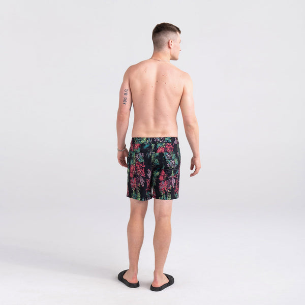 Back - Model wearing Betawave 2N1 Swim Short Regular in Midnight Tropics- Multi