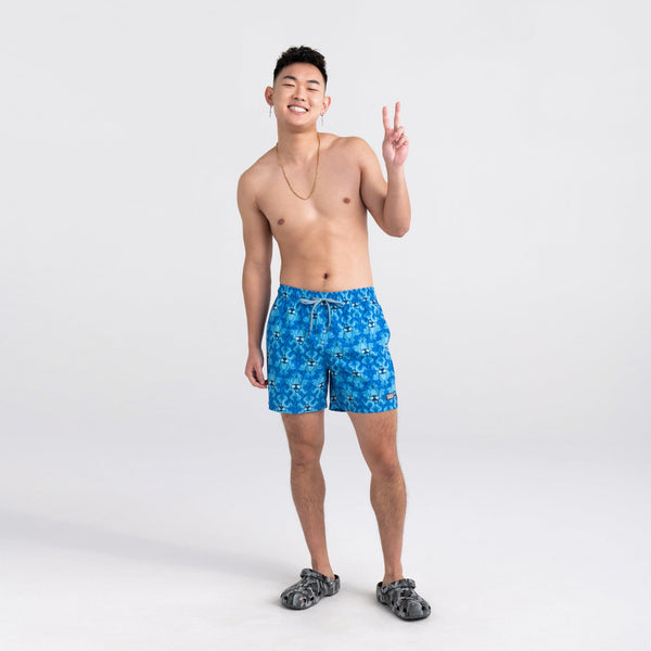 Front - Model wearing Oh Buoy 2N1 Swim Short Trunk in Krakken Toile- Blue