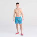 Front - Model wearing Oh Buoy 2N1 Swim Trunk 5" in Shrimp Cocktail-Blue Moon