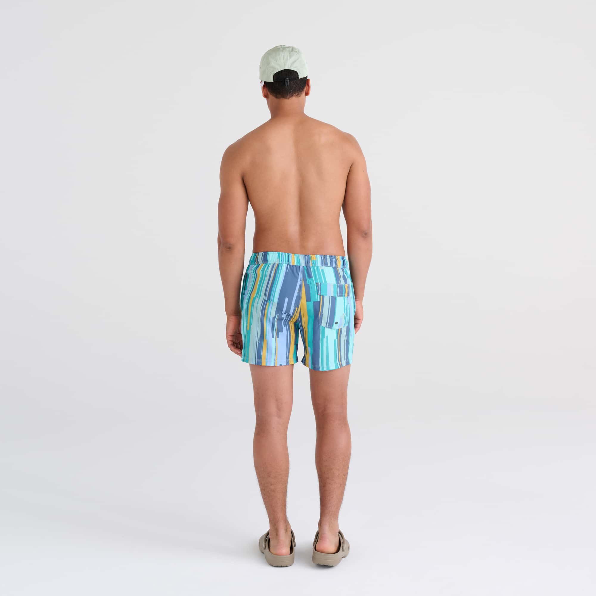 Back - Model wearing Oh Buoy 2N1 Swim Trunk 5" in Soft Stripe- Aqua Splash