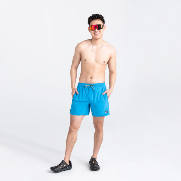 Front - Model wearing Oh Buoy 2N1 Swim Volley Short 5" in Tropical Blue