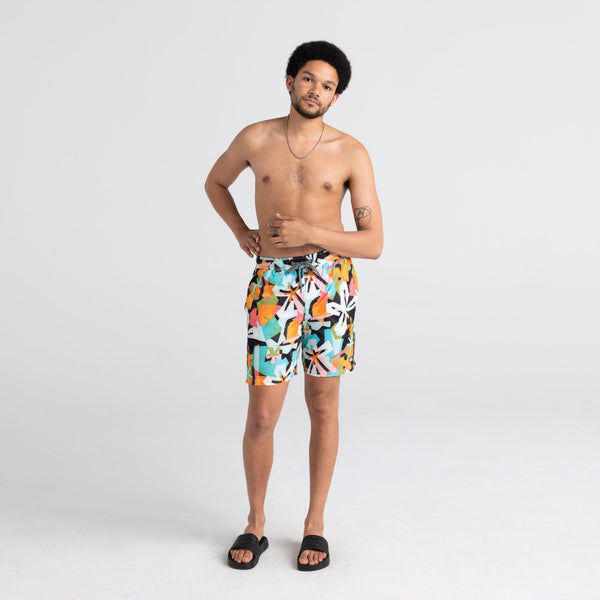Front - Model wearing Oh Buoy 2N1 Swim Short 7" in Multi Asterix Tropix