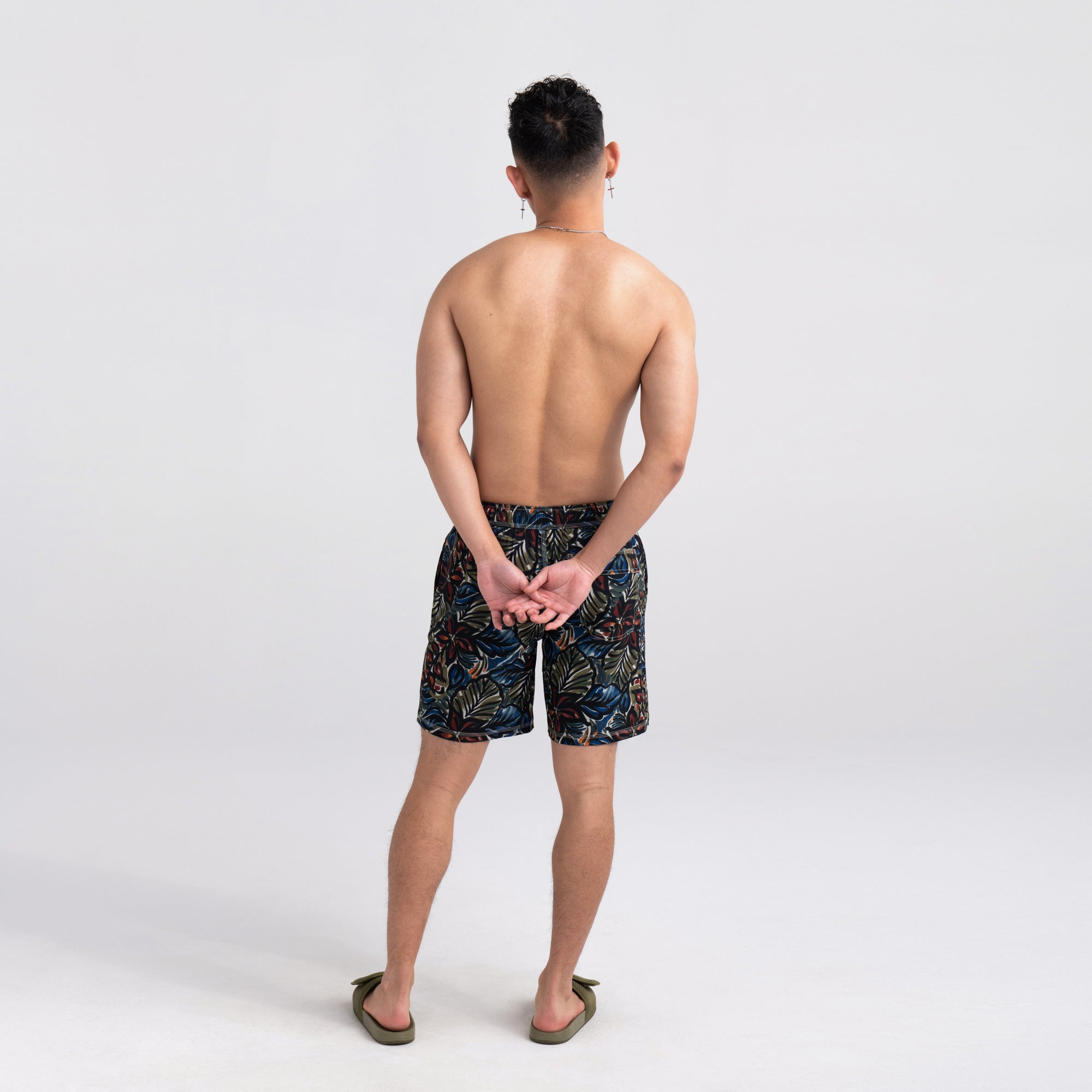 Back - Model wearing Oh Buoy 2N1 Swim Short Regular in Painterly Paradise- Multi