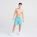 Front - Model wearing Oh Buoy 2N1 Swim Trunk 7" in Sharkski- Turquoise