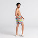 Back - Model wearing Oh Buoy 2N1 Swim Short 7" in Tech Rec Stripe- Multi