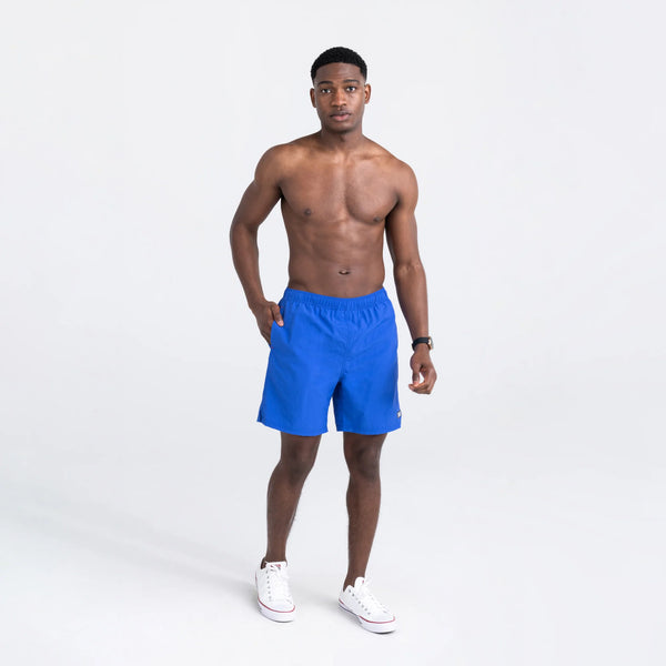 Front - Model wearing Go Coastal 2N1 Swim Volley Short 7" in Sport Blue